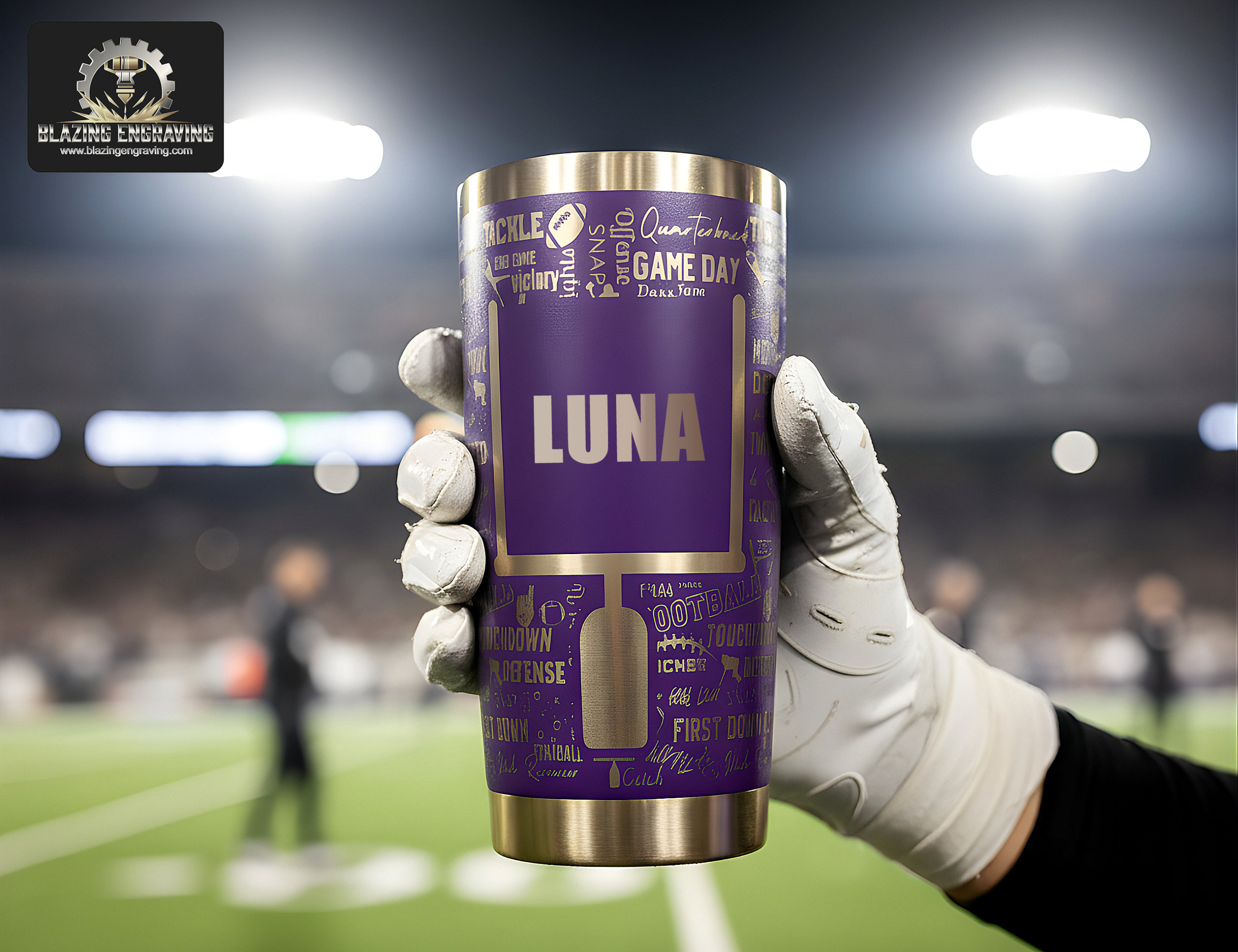 A gloved hand holding a stainless steel tumbler with a laser-engraved football mom design, personalized with the name "Luna," inside a football stadium with a crowd in the background. Blazing Engraving logo in the top left corner.